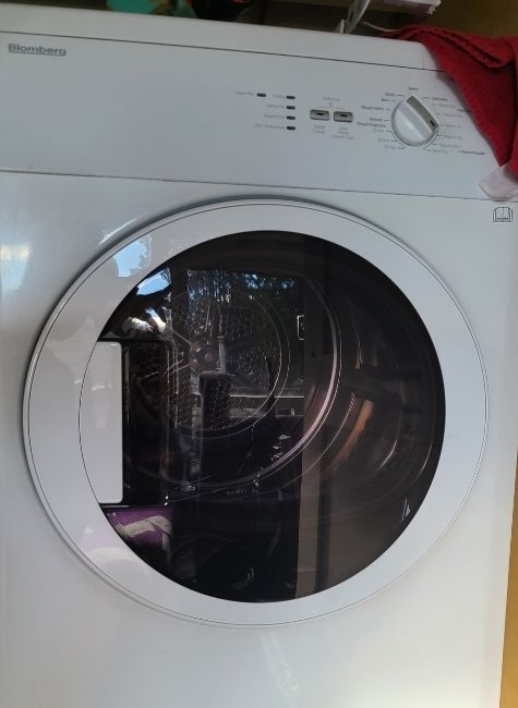 White Blomberg Washer Repair in Vancouver
