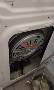 Inspecting the dryer before performing a dryer repair in Vancouver.