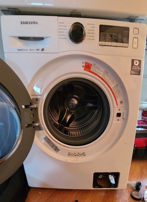 Samsung Washer with door open in a home located in Suburban Vancouver