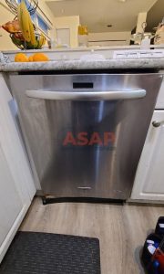 A Stainless Steel Whirlpool dishwasher