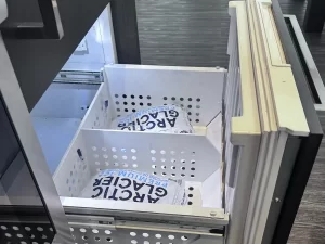 Thermador bottom freezer drawer pulled open with its basket back on the slides after the repair in Coquitlam, BC