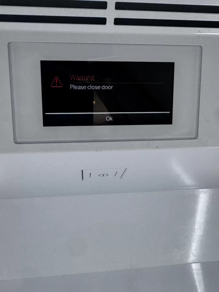Thermador fridge control panel showing a Please close door warning